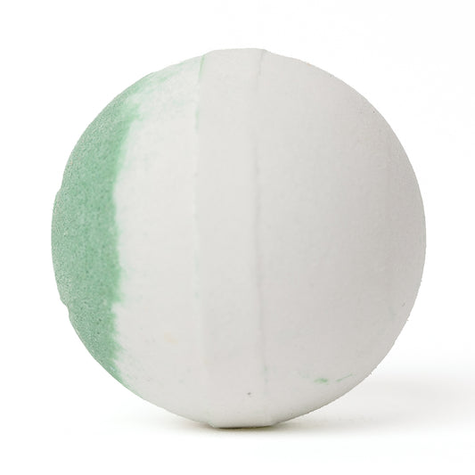 Spherical white bath bomb with a soft green accent stripe on a white background.