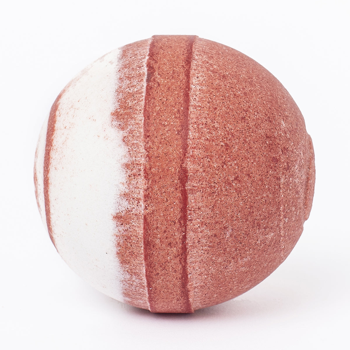 Round Hibiscus Passion bath bomb with a textured, two-tone design featuring deep red and creamy white stripes.